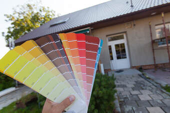 House exterior painting with color swatch ideas.